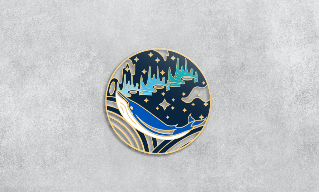 a vector illustration design of an Enamel Pin featuring fish, nature,stars in blue theme, golden outlines