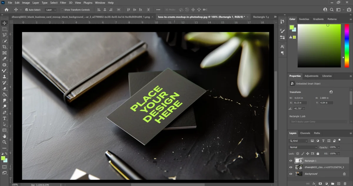 closeup shot of a business card mockup with text on it Steps to create product mockup with ai and photoshop